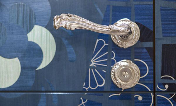 Door knob and door made using supreme-quality materials and finishes in the perfect yacht interior on board a motor yacht